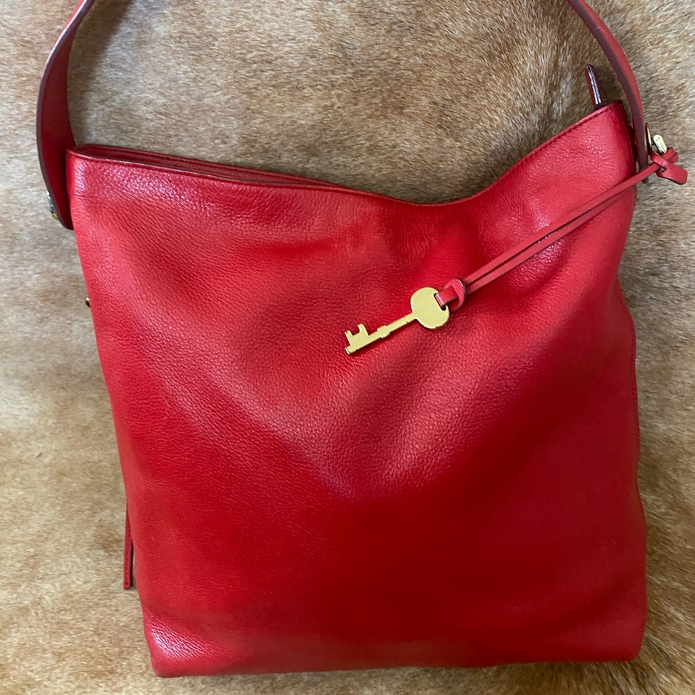 Red leather Fossil hand bag. Excellent condition.
